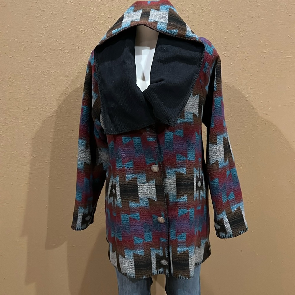 Rhonda Stark TETON swing with raglan sleeve style coat with side pockets.